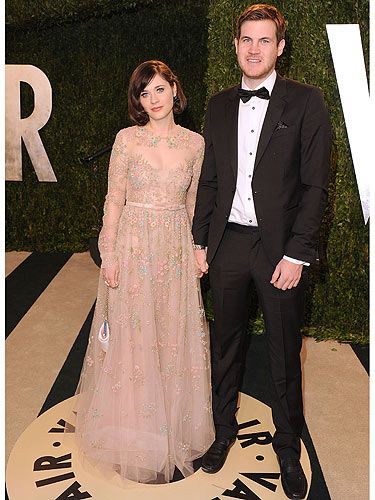 <p>Zooey Deschanel looked ethereal at the 2013 Vanity Fair Oscar Party. The New Girl actress arrived with her handsome screenwriter boyfriend Jamie Linden. Zooey wore a Valentino gown with Dana Rebecca Designs jewellery.</p>