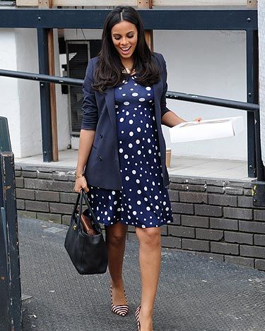 Another day, another great maternity look from Rochelle Humes. The Saturdays' singer didn't let her growing bump get in the way of her fashion sense as she was snapped leaving the ITV studios. Rochelle teamed her favourite stripy Dune heels with a navy polka dot dress and kept warm with a navy blazer for an uber-chic look.