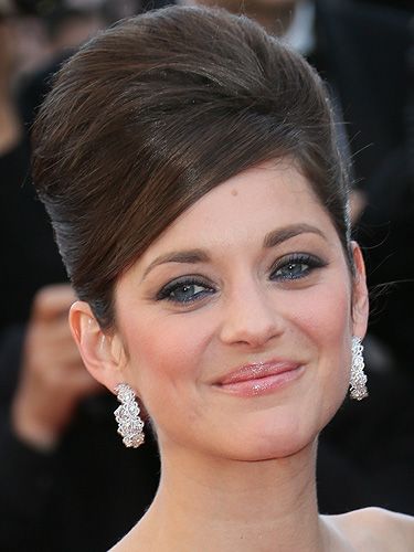 <p>Channelling classic Cannes glamour, French screen star, Marion Cotillard showed off the ultimate beehive on the red carpet. Her makeup made things modern, with blue eyeliner on her lower lids and nude gloss on her lips. Stunning.</p>
<p><strong>Get the look</strong> with a bit of backcombing and a lot of <a title="http://www.beautybay.com/haircare/sexyhair/bigwhatateasebackcombinabottle/?pcrid=12485385563&gclid=CI-ore36prcCFeXItAodNzoAzA" href="http://www.beautybay.com/haircare/sexyhair/bigwhatateasebackcombinabottle/?pcrid=12485385563&gclid=CI-ore36prcCFeXItAodNzoAzA" target="_blank">Sexy Hair Big What A Tease Backcomb In A Bottle</a>, £11.66</p>
