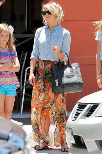 <p>Isn't Julianne Hough the perfect auntie? She treated her two nieces to a shopping trip in sunny LA on Wednesday and judging from her Twitter feed, they had a blast! The actress embodied LA cool in a denim crop shirt, which she layered over a sheer floral skirt split to the thigh. Proving the devil's in the detail, she wore oversized shades, tote bag and bejwelled sandals in the same shade of black. What a cool aunt.</p>