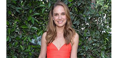 <p>Natalie Portman's media appearances are rare, but when she does get snapped at an event, her outfits never disappoint. She pulled out all the stops to support hubbie Benjamin Millepied yesterday at his L.A. Dance Project Inaugural Benefit Gala. Being the face of Dior fragrance, it's only natural the brunette opted for a dress by the French Haute Couture house. The tomato red dress with sweetheart neckline and dip hem suited her petite frame perfectly and we love the little flash of pink from the lining. She accessorised with cream and white strappy sandals and a black Richard Millie watch. She opted for a natural beauty look, with tousled hair and nude makeup. </p>