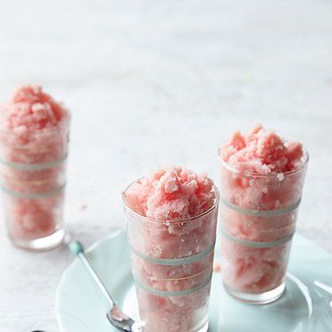 <p>80 calories</p>
<p><em>This light and airy mix of frozen watermelon and yogurt makes a refreshing dessert. It's easiest made with an ice-cream machine, but there are also instructions for making it without one in the book.</em></p>
<p><strong>Serves:</strong> 6 </p>
<p><strong>Preparation time:</strong> 20 minutes, plus 4 hours freezing</p>
<p><strong>Cook time:</strong> about 5 minutes, plus 20 minutes cooling</p>
<p><strong>Ingredients:</strong></p>
<p>50g caster sugar (197 cals)</p>
<p>1.5kg watermelon, one normal-sized watermelon, flesh only (600g/11/4lb), deseeded and diced (186 cals)</p>
<p>100g low-fat Greek yogurt (80 cals)</p>
<p>1 tsp vanilla extract (12 cals)</p>
<p>Juice of 1 lime (4 cals)</p>
<p><strong>Preparation:</strong></p>
<p>Heat the sugar and 50ml (scant ¼ cup) water in a small saucepan over a medium heat and cook, stirring constantly, until the sugar is dissolved. Remove from the heat and leave to cool.</p>
<p>Put the watermelon into a blender and pulse until smooth. Depending on the size of the blender you'll need to do this in several batches. Transfer the watermelon to a large bowl and stir in the sugar syrup, yogurt, vanilla extract and lime juice. Pour the mixture through a sieve into another bowl, pressing the watermelon gently against the sieve to release all the juice and discard the pulp.</p>
<p>Transfer the mixture to an ice-cream machine and freeze for about one hour or until frozen and it is 'soft serve' consistency. Place the sherbet in a freezerproof container and freeze until needed. Alternatively, transfer the mixture to a freezerproof container and freeze. After 30 minutes take the sherbet out of the freezer and mash it with a fork to remove any ice crystals, then return it to the freezer. Repeat this process every 30 minutes until frozen. It will take about four hours to freeze completely. Remove from the freezer about 10 minutes before serving.</p>