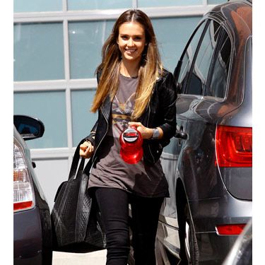 <p>Jessica went all biker chick on us as she was spotted running errands in LA yesterday. The young mum kept to black tones as she matched a print tee, skinny jeans, studded boots and a black tote and covered up in a biker jacket. Sleek, poker straight hair with a centre parting toned down the look.</p>