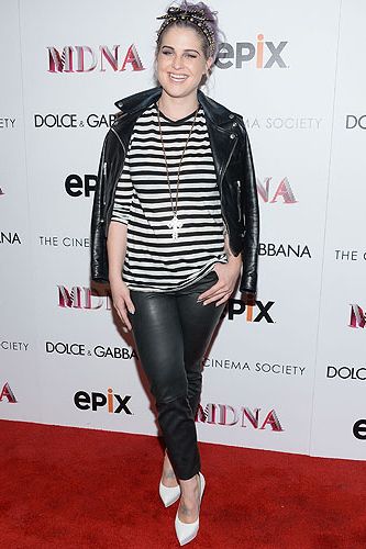 <p>Kelly Osbourne traded in her chic Kelly-O look and went back to her punk roots at the Dolce & Gabbana And The Cinema Society Present The Epix World Premiere Of Madonna: The MDNA Tour in New York. Kelly looked every inch the rock chick in a black and white Breton top, black leather trousers and a biker jacket, which she accessorised with a crucifix necklace and patent heels. We love the studded hairband too!</p>