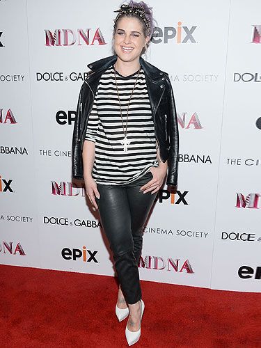 <p>Kelly Osbourne traded in her chic Kelly-O look and went back to her punk roots at the Dolce & Gabbana And The Cinema Society Present The Epix World Premiere Of Madonna: The MDNA Tour in New York. Kelly looked every inch the rock chick in a black and white Breton top, black leather trousers and a biker jacket, which she accessorised with a crucifix necklace and patent heels. We love the studded hairband too!</p>
