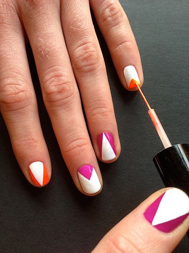 <p>On the white nails paint on a small triangle at the cuticle end with the striper and orange or purple polishes (like a half moon but triangle shaped). Vary the colour you use on each nail and reverse the design on some nails so the half moon triangle is at the tip! This will give it that kaleidoscope effect.</p>