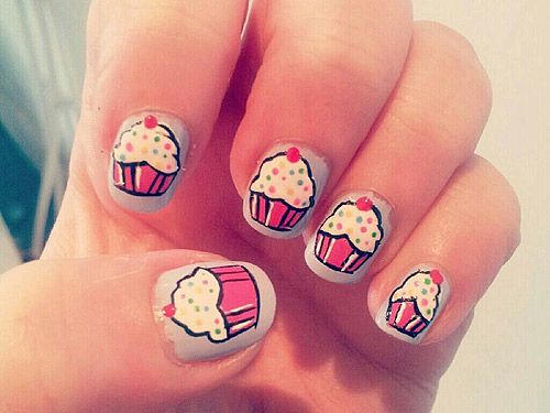 <p>These sweet treats look good enough to eat. Manicurists at <a href="http://www.needlesandnailsbrighton.co.uk%20" target="_blank">Needles and Nails</a> used the <a href="http://www.modelsownit.com/products/nails/nail-art-pens.html" target="_blank">Model's Own</a> WAH Nails nail art pens to create the cupcake design. It's all the fun, without all the calories. Perfect.</p>