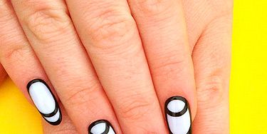 <p>Have fun with monochrome thanks to this amazing design by The Illustrated Nail. Follow these simple steps to help you create these psychedelic talons.<br /><br />1. Paint a white coat over your whole nail – this only works with longer talons, so avoid if you're keeping your claws short.</p>
<p>2. Using a black nail art pen, carefully circle your entire nail.</p>
<p>3. With the pen, draw half-moon crescents across the top of all your nails, and along the bottom of every other nail.</p>
<p>4. Finish with a clear topcoat and voila!</p>