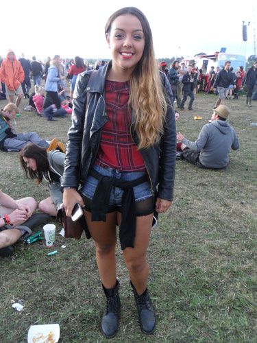 <p>We found a punk fashion lover in the fields of Reading as Kate, 18 stepped out in a tartan top worn under a leather jacket. To continue the theme she wore sheer cycling shorts under her denim hot pants toughening things up further with biker boots.</p>