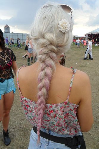 <p>What a pretty plait; this gal's hair has been loosely swept into a long braid, and the subtle dip-dye that fades into pink is a perfect look for a festival.</p>
<p>Another little flower accessory makes this plait a boho-dream. Vanessa Hudgens would be jealous.</p>