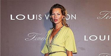 <p><a href="http://cosmopolitan.co.uk/fashion/news/kate-moss-kaftan-holiday-style" target="_blank">Kate Moss</a> showed off her tan at the Louis Vuitton 'Timeless Muses' exhibition in Tokyo. Wearing a yellow rhinestone-studded bell-sleeved dress by Louis Vuitton (who else?) and grey LV sandals, we thought the model positively glowed with glamour.</p>
<p><a href="http://www.cosmopolitan.co.uk/fashion/love/love-it-or-loathe-it-kate-moss-yellow-dress" target="_blank">DO YOU LOVE OR LOATHE KATE'S LOOK? VOTE!</a></p>
<p class="fb_frame_side_right_paragraph"><a href="http://www.cosmopolitan.co.uk/fashion/shopping/new-in-store-27-august#fbIndex1" target="_blank">SHOP THIS WEEK'S BEST NEW BUYS</a></p>
<p class="fb_frame_side_right_paragraph"><a href="http://www.cosmopolitan.co.uk/fashion/news/" target="_blank">SEE THE LATEST FASHION NEWS</a></p>