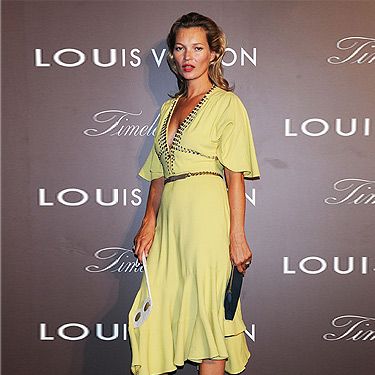 <p><a href="http://cosmopolitan.co.uk/fashion/news/kate-moss-kaftan-holiday-style" target="_blank">Kate Moss</a> showed off her tan at the Louis Vuitton 'Timeless Muses' exhibition in Tokyo. Wearing a yellow rhinestone-studded bell-sleeved dress by Louis Vuitton (who else?) and grey LV sandals, we thought the model positively glowed with glamour.</p>
<p><a href="http://www.cosmopolitan.co.uk/fashion/love/love-it-or-loathe-it-kate-moss-yellow-dress" target="_blank">DO YOU LOVE OR LOATHE KATE'S LOOK? VOTE!</a></p>
<p class="fb_frame_side_right_paragraph"><a href="http://www.cosmopolitan.co.uk/fashion/shopping/new-in-store-27-august#fbIndex1" target="_blank">SHOP THIS WEEK'S BEST NEW BUYS</a></p>
<p class="fb_frame_side_right_paragraph"><a href="http://www.cosmopolitan.co.uk/fashion/news/" target="_blank">SEE THE LATEST FASHION NEWS</a></p>