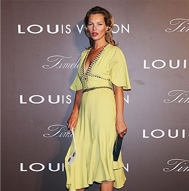 <p><a href="http://cosmopolitan.co.uk/fashion/news/kate-moss-kaftan-holiday-style" target="_blank">Kate Moss</a> showed off her tan at the Louis Vuitton 'Timeless Muses' exhibition in Tokyo. Wearing a yellow rhinestone-studded bell-sleeved dress by Louis Vuitton (who else?) and grey LV sandals, we thought the model positively glowed with glamour.</p>
<p><a href="http://www.cosmopolitan.co.uk/fashion/love/love-it-or-loathe-it-kate-moss-yellow-dress" target="_blank">DO YOU LOVE OR LOATHE KATE'S LOOK? VOTE!</a></p>
<p class="fb_frame_side_right_paragraph"><a href="http://www.cosmopolitan.co.uk/fashion/shopping/new-in-store-27-august#fbIndex1" target="_blank">SHOP THIS WEEK'S BEST NEW BUYS</a></p>
<p class="fb_frame_side_right_paragraph"><a href="http://www.cosmopolitan.co.uk/fashion/news/" target="_blank">SEE THE LATEST FASHION NEWS</a></p>