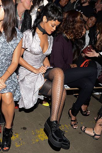 <p>Rihanna clearly finds her own fashion more fascinating than anything the runway can offer... Only kidding, the Opening Ceremony catwalk show hadn't started when the singer was snapped rocking a 90s grunge look.</p>
<p><a href="http://www.cosmopolitan.co.uk/fashion/news/victoria-beckham-nyfw-show-2013" target="_blank">SEE VICTORIA BECKHAM'S SS14 COLLECTION</a></p>
<p><a href="http://www.cosmopolitan.co.uk/fashion/Fashion-week/fashion-week-daily-live-streams" target="_blank">WATCH: NEW YORK FASHION WEEK LIVE</a></p>
<p><a href="http://www.cosmopolitan.co.uk/fashion/shopping/the-fashion-fix-shop-bargain-buys" target="_blank">SHOP: FASHION BUYS FOR £10 OR LESS</a></p>
