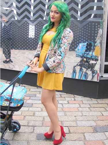 Dying your hair green is brave. Teaming it with a floral jacket, yellow dress, red shoes and bold make-up is medal worthy. Say hello to alternative model, Becky Cremer!
