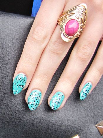 Zoe layered the L'Oreal speckled top coat over a turquoise shade for an eye-catching mani.