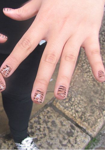 Like most nail art, this tiger pattern must have taken a lot of time, but it looks amazing!