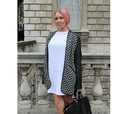 Can you say Baby Spice? We're loving this outfit's serious 90's vibes, from the white minidress to those gorgeous stacked platforms to the Manic Panic hair. The coat's leather inserts and that sturdy bag stop it from being TOO sugary sweet.