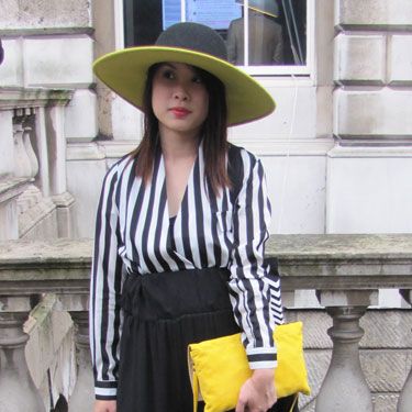 We adore this look! The yellow accessories give this monochrome outfit serious fashion cred. 