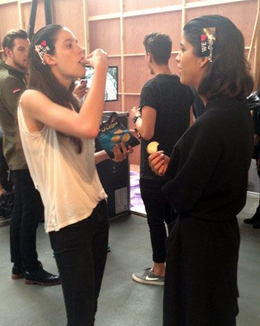 SOUND THE MODELS EATING KLAXON. House of Holland's beauties were cheerily tucking into some crisps. Right on.