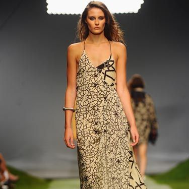 <p>Layers and mixed prints in this eclectic maxi-dress.</p>
