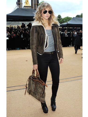 Suki Waterhouse's laid-back cool was epitomised with her shearline coat, grey vest and skinnies as she arrived at Kensington Gardens. Loving her studded bag, too. 