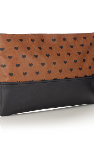<p>Inspired by Burberry, we totally heart this oversized clutch.</p>
<p>Heart print clutch, £19, <a href="http://uk.accessorize.com/view/product/uk_catalog/acc_1,acc_1.1/4892262200?pageSize=&showAll=true" target="_blank">accessorize.com</a></p>