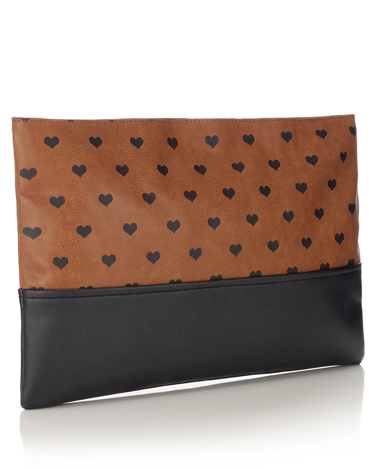 <p>Inspired by Burberry, we totally heart this oversized clutch.</p>
<p>Heart print clutch, £19, <a href="http://uk.accessorize.com/view/product/uk_catalog/acc_1,acc_1.1/4892262200?pageSize=&showAll=true" target="_blank">accessorize.com</a></p>