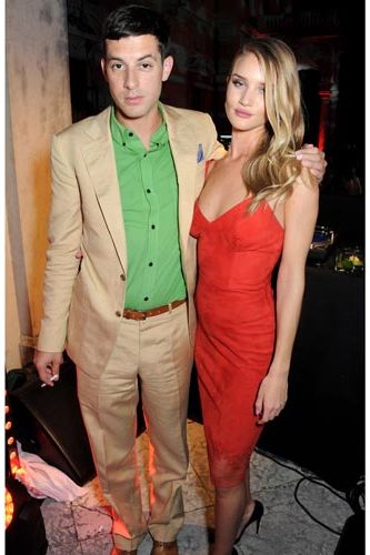 <p>Rosie HW accessorised her look with a man - Mark Ronson to be exact. The DJ spun some tracks at the Villa after Lily Allen took to the stage, looking dapper in a golden-hued suit and bright green shirt. </p>