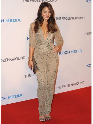 <p>Vanessa channelled Bollywood glamour in this outfit for the Frozen Ground premiere. The champagne-hue and embellished detail of this plunge-neck jumpsuit was sophisticated yet sexy and the dark caramel tones of her hair worked perfectly with this outfit.</p>
