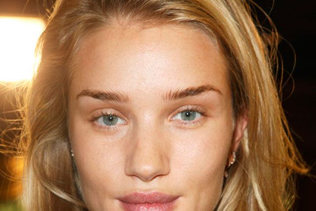 <p><strong>The makeup look:</strong> <em>No</em> makeup! "Raw, natural beauty" according to Makeup Artist Tom Pecheux. The natural look (as sported on Rosie Huntington-Whiteley), is all about clever skincare.</p>
<p><strong>The products:</strong> All MAC - Prep + Prime Moisture Infusion mixed with Studio Moisture Fix SPF 15, massaged into the face to instantly hydrate, replenish, and revive the skin. Studio Finish SPF 35 Concealer applied only where needed. Fast Response Eye Cream patted and blended into the eye area to soothe and soften skin. Lip Conditioner patted into lips to nourish and lightly moisturise.</p>