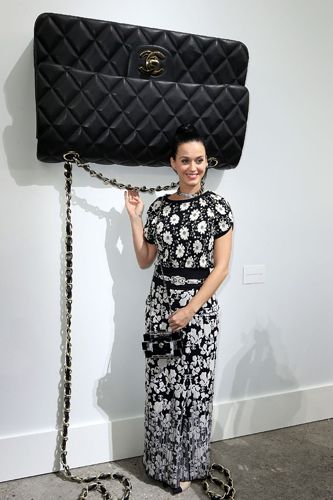 <p>Oh look! It's Katy Perry and a GINORMOUS CHANEL HANDBAG. This picture is just full of win.</p>
<p><a href="http://www.cosmopolitan.co.uk/fashion/shopping/paris-fashion-week-street-style" target="_blank">SEE: PARIS FASHION WEEK STREET STYLE</a></p>
<p><a href="http://www.cosmopolitan.co.uk/fashion/shopping/shop-payday-fashion-treats" target="_blank">TREAT YOURSELF: STYLISH PAYDAY SPLURGES</a></p>
<p><a href="http://www.cosmopolitan.co.uk/fashion/celebrity/" target="_blank">GET THE LATEST CELEBRITY TREND NEWS</a></p>
