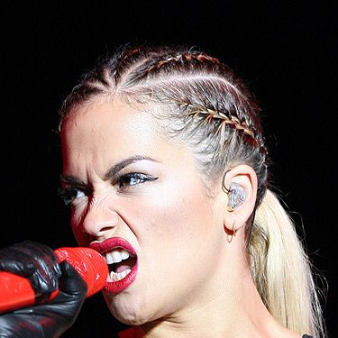 <p>Cornrow braids take the pretty plaited trend into edgy territory and Rita Ora works it with ease. The tight-to-the-head braids are not for everyone but they give the effect of a sharp silhouette without the need of scissors.</p>