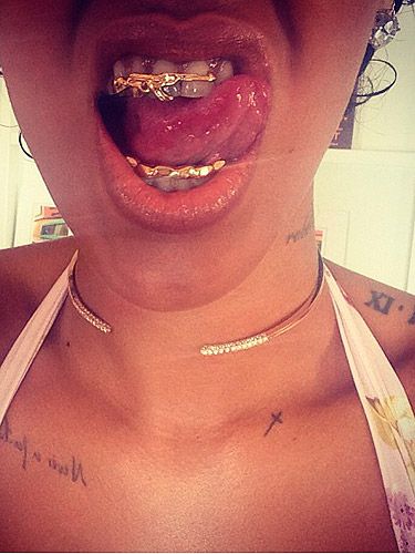 Rihanna's tattoo collection in pictures :: celebrity tattoos