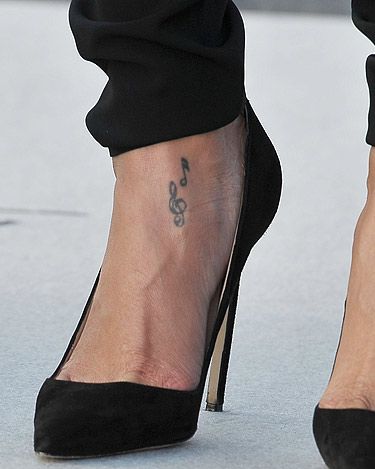 <p>The singer's first tattoo is thought to have been the treble clef and sixteenth note on her left foot.</p>
<p><a href="http://www.cosmopolitan.co.uk/fashion/celebrity/hot-celebrity-tattoos" target="_blank">HOT CELEBRITY TATTOO INSPIRATION</a></p>
<p><a href="http://www.cosmopolitan.co.uk/fashion/celebrity/celebrity-tattoo-dos-donts" target="_blank">CELEBRITY TATTOO DO'S AND DONT'S</a></p>
<p><a href="http://www.cosmopolitan.co.uk/celebs/entertainment/celebrity-tattoo-trend-heart-tattoos-4688" target="_blank">CELEBRITY TREND: HEART TATTOOS</a></p>