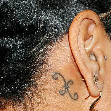 <p>Done early in Rihanna's career, the singer was inked by a famous Brazilian artist who usually makes his clients book three years in advance.</p>
<p><a href="http://www.cosmopolitan.co.uk/fashion/celebrity/hot-celebrity-tattoos" target="_blank">HOT CELEBRITY TATTOO INSPIRATION</a></p>
<p><a href="http://www.cosmopolitan.co.uk/fashion/celebrity/celebrity-tattoo-dos-donts" target="_blank">CELEBRITY TATTOO DO'S AND DONT'S</a></p>
<p><a href="http://www.cosmopolitan.co.uk/celebs/entertainment/celebrity-tattoo-trend-heart-tattoos-4688" target="_blank">CELEBRITY TREND: HEART TATTOOS</a></p>