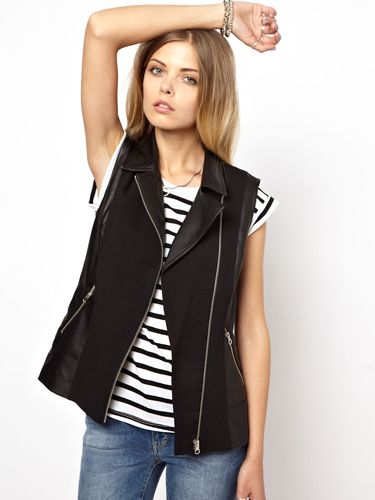 <p>Taking the gilet from posh to rock, this faux leather alternative to the coat is perfect for not-too-blustery Autumn days in the city. Pair with black skinny jeans, shoe boots and an angora knit for a cosy, rock-chic look.</p>
<p>Noisy May gilet with faux leather, £45, <a href="http://www.asos.com/Noisy-May/Noisy-May-Gilet-With-Faux-Leather/Prod/pgeproduct.aspx?iid=3170818&cid=2623&Rf900=3717&sh=0&pge=0&pgesize=36&sort=3&clr=Black" target="_blank">ASOS </a></p>
<p><a href="http://www.cosmopolitan.co.uk/fashion/shopping/pauls-boutique-bags-winter-2013?page=1" target="_blank">TEN NEW HANDBAGS FOR A/W13</a></p>
<p><a href="http://www.cosmopolitan.co.uk/fashion/news/m-and-s-best-of-british-fashion" target="_blank">M&S LAUNCHES BEST OF BRITISH COLLECTION</a></p>
<p><a href="http://www.cosmopolitan.co.uk/fashion/shopping/womens-clothing-under-ten-pounds" target="_blank">THE PERFECT WHITE SHIRT FOR A TENNER</a></p>