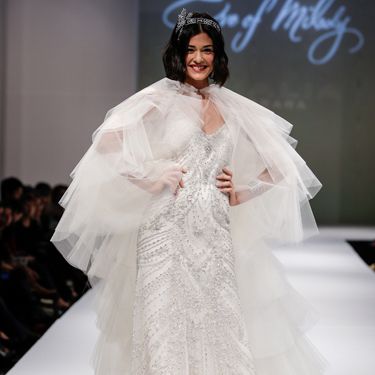 <p>Wedding dress, check. Cape... check? Not too sure about this one, although the model seems pretty chuffed.</p>
<p><a href="http://www.cosmopolitan.co.uk/fashion/shopping/halloween-outfits" target="_blank">EFFORTLESS HALLOWEEN OUTFITS</a></p>
<p><a href="http://www.cosmopolitan.co.uk/fashion/shopping/new-in-store-14-oct?page=1" target="_blank">NEW IN STORE THIS WEEK</a></p>
<p><a href="http://www.cosmopolitan.co.uk/fashion/shopping/pauls-boutique-bags-winter-2013?page=1" target="_blank">TEN NEW HANDBAGS FOR A/W13</a></p>