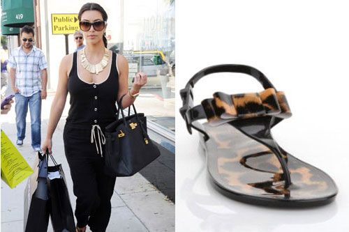<p>Newly engaged Kim K soaked up the LA sun with a big shopping spree. Opting for sensible footwear to accomadate her retail therapy, the socialite wore a gorgeous pair of leopard print jelly shoes, available for £29.95 from<a href=" http://www.modainpelle.com/Ladies-Sandals/Flat/oreana-in-Leopard "target="_blank"> modainpelle.com</a></p>