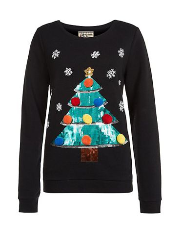<p>Gather all your presents in just one jumper - we love the bright sequins against the black knit.</p>
<p>Christmas jumper, £24.99, <a href="http://www.newlook.com/shop/womens/knitwear/cream-reindeer-fluffy-christmas-jumper_288704212" target="_blank">New Look</a></p>
<p><a href="http://www.cosmopolitan.co.uk/fashion/shopping/christmas-jumpers-2013-primark-womens" target="_blank">PRIMARK'S CHRISTMAS JUMPERS ARE OUT</a></p>
<p><a href="http://www.cosmopolitan.co.uk/fashion/shopping/halloween-outfits" target="_blank">EFFORTLESS HALLOWEEN OUTFITS FROM THE HIGH STREET</a></p>
<p><a href="http://www.cosmopolitan.co.uk/fashion/shopping/celebrity-winter-coat-inspiration" target="_blank">CELEBRITY WINTER COAT INSPIRATION</a></p>