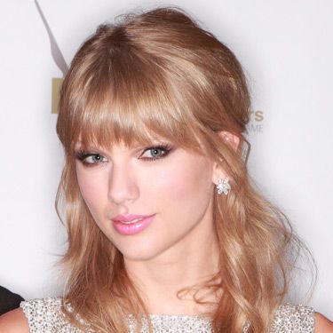 <p>Taylor Swift (pictured), Suki Waterhouse, Millie Mackintosh and Lily Allen are doing this season's full fringes oh-so-well. Slightly chopping in cut and lash-kissing in length, the new bangs are soft and sultry. We love.</p>
<p><a href="http://www.cosmopolitan.co.uk/beauty-hair/news/styles/celebrity/face-framing-fringes-hair-trend" target="_blank">SEE MORE CELEBS WITH COOL FRINGES</a> </p>