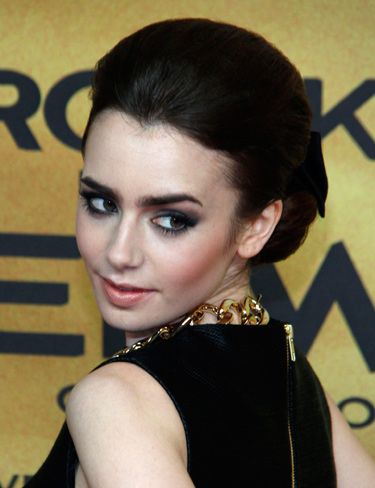 <p>Looking like a modern-day Audrey Hepburn, Lily Collins takes on the trend with big silver screen hair and seriously smokey eye makeup. And totally pulls it off, naturally.  </p>
<p><a href="http://www.cosmopolitan.co.uk/beauty-hair/news/styles/celebrity/cosmo-hairstyle-of-the-day" target="_blank">COSMO'S HAIRSTYLE OF THE DAY</a></p>
<p><a href="http://www.cosmopolitan.co.uk/beauty-hair/news/styles/celebrity/frow-hair-celebrity-fashion-week" target="_blank">FRONT ROW HAIRSTYLES WE LOVE</a></p>
<p><a href="http://www.cosmopolitan.co.uk/beauty-hair/news/styles/celebrity/" target="_blank">MORE CELEBRITY HAIR IDEAS</a></p>