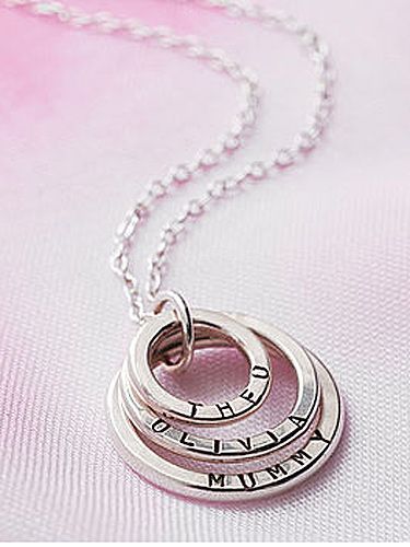 <p>Why not give your mum a personalized necklace which can feature up to three names or words on a silver ring necklace. She'll love this one off gift. Handmade in Britain so she'll love the hand stamped bespoke design.</p>
<div>Personalised Family Names Necklace, £59, <a href="http://www.notonthehighstreet.com/poshtotty/product/new-years-mummy-and-children-necklace" target="_blank">notonthehighstreet.com</a></div>
<p> </p>