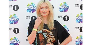 <p>Always-stylish Fearne looked fierce in her tiger t-shirt and neon skirt, which she paired with black tights and heeled booties.</p>
<p><a href="http://www.cosmopolitan.co.uk/beauty-hair/news/trends/celebrity-beauty/celebrities-go-makeup-free" target="_blank">CELEBRITIES WITHOUT MAKEUP</a></p>
<p><a href="http://www.cosmopolitan.co.uk/beauty-hair/news/trends/celebrity-beauty/best-celebrity-beauty-tips" target="_blank">BEST CELEBRITY BEAUTY TIPS</a></p>
<p><a href="http://www.cosmopolitan.co.uk/beauty-hair/news/trends/celebrity-beauty/celebs-in-wigs" target="_blank">CELEBRITIES IN WIGS</a></p>