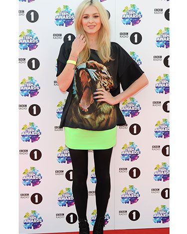 <p>Always-stylish Fearne looked fierce in her tiger t-shirt and neon skirt, which she paired with black tights and heeled booties.</p>
<p><a href="http://www.cosmopolitan.co.uk/beauty-hair/news/trends/celebrity-beauty/celebrities-go-makeup-free" target="_blank">CELEBRITIES WITHOUT MAKEUP</a></p>
<p><a href="http://www.cosmopolitan.co.uk/beauty-hair/news/trends/celebrity-beauty/best-celebrity-beauty-tips" target="_blank">BEST CELEBRITY BEAUTY TIPS</a></p>
<p><a href="http://www.cosmopolitan.co.uk/beauty-hair/news/trends/celebrity-beauty/celebs-in-wigs" target="_blank">CELEBRITIES IN WIGS</a></p>