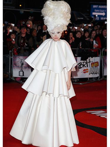 <p>In a surprising demure dress, yet still sky-high hair, Lady Gaga made an appearance at the 2011 Brit Awards in Earl's Court. We can't help but wonder; how did she keep her head up?</p>
<p><a href="http://www.cosmopolitan.co.uk/celebs/entertainment/lady-gaga-marijuana-addiction" target="_blank">LADY GAGA TALKS ADDICTION</a></p>
<p><a href="http://www.cosmopolitan.co.uk/celebs/entertainment/lady-gaga-naked-gay-nightclub?click=main_sr" target="_blank">LADY GAGA GETS COMPLETELY NAKED AT G-A-Y NIGHTCLUB</a></p>
<p><a href="http://www.cosmopolitan.co.uk/celebs/celebrity-gossip/lady-gaga-neck-tattoo-rio?click=main_sr" target="_blank">GAGA SHOWS OFF BRAND NEW NECK TATTOO</a></p>
