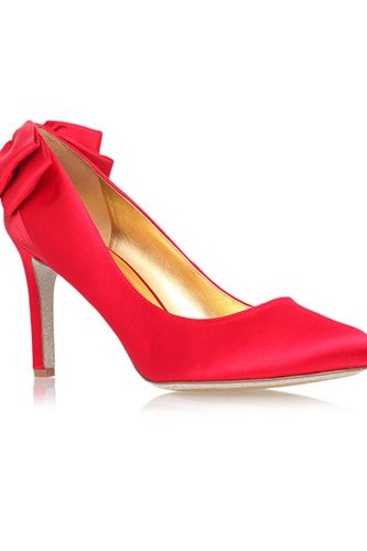 <p>They're not quite ruby slippers, but we can guarantee owning these scarlet wonders would transport us to a happy place. The pretty bows at the back are the perfect festive finishing touch. Santa baby, please read this! </p>
<p>Red High Heel Court Shoes, £125, <a href="http://www.kurtgeiger.com/women/shoes/givemelux2-red-satin-42-nine-west-shoe.html" target="_blank">kurtgeiger.com</a></p>
<p><a href="http://www.cosmopolitan.co.uk/fashion/shopping/christmas-party-accessories-jewellery-bags" target="_blank">OUR FAVOURITE PARTY ACCESSORIES</a></p>
<p><a href="http://www.cosmopolitan.co.uk/fashion/shopping/cheap-christmas-party-dresses" target="_blank">PARTY DRESSES FOR UNDER £25</a></p>
<p><a href="http://www.cosmopolitan.co.uk/fashion/shopping/womens-christmas-fair-isle-jumpers-2013" target="_blank">NINE NIFTY KNITS</a></p>