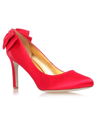 <p>They're not quite ruby slippers, but we can guarantee owning these scarlet wonders would transport us to a happy place. The pretty bows at the back are the perfect festive finishing touch. Santa baby, please read this! </p>
<p>Red High Heel Court Shoes, £125, <a href="http://www.kurtgeiger.com/women/shoes/givemelux2-red-satin-42-nine-west-shoe.html" target="_blank">kurtgeiger.com</a></p>
<p><a href="http://www.cosmopolitan.co.uk/fashion/shopping/christmas-party-accessories-jewellery-bags" target="_blank">OUR FAVOURITE PARTY ACCESSORIES</a></p>
<p><a href="http://www.cosmopolitan.co.uk/fashion/shopping/cheap-christmas-party-dresses" target="_blank">PARTY DRESSES FOR UNDER £25</a></p>
<p><a href="http://www.cosmopolitan.co.uk/fashion/shopping/womens-christmas-fair-isle-jumpers-2013" target="_blank">NINE NIFTY KNITS</a></p>