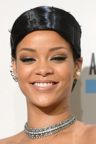 <p>Obviously Rihanna went for a stand-out style, doing an exaggerated comb-over held down with pins. The jury's out.</p>
<p><a href="http://www.cosmopolitan.co.uk/beauty-hair/news/styles/celebrity/celebrity-party-hair-style-inspiration" target="_blank">PARTY HAIRSTYLE IDEAS</a></p>
<p><a href="http://www.cosmopolitan.co.uk/beauty-hair/news/trends/celebrity-beauty/pixie-crop-celebrity-icons" target="_blank">CELEBRITY TREND: SHORT HAIR</a></p>
<p><a href="http://www.cosmopolitan.co.uk/beauty-hair/news/styles/celebrity/face-framing-fringes-hair-trend?click=main_sr" target="_blank">COOL CELEBRITY FRINGES</a></p>