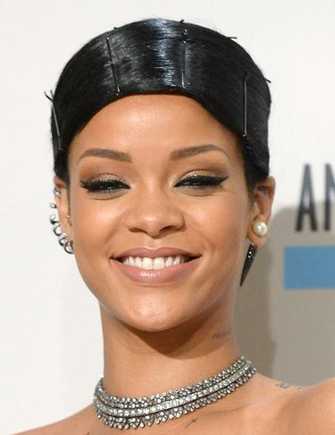 <p>Obviously Rihanna went for a stand-out style, doing an exaggerated comb-over held down with pins. The jury's out.</p>
<p><a href="http://www.cosmopolitan.co.uk/beauty-hair/news/styles/celebrity/celebrity-party-hair-style-inspiration" target="_blank">PARTY HAIRSTYLE IDEAS</a></p>
<p><a href="http://www.cosmopolitan.co.uk/beauty-hair/news/trends/celebrity-beauty/pixie-crop-celebrity-icons" target="_blank">CELEBRITY TREND: SHORT HAIR</a></p>
<p><a href="http://www.cosmopolitan.co.uk/beauty-hair/news/styles/celebrity/face-framing-fringes-hair-trend?click=main_sr" target="_blank">COOL CELEBRITY FRINGES</a></p>